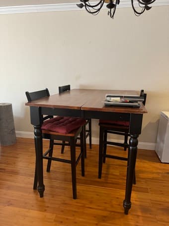 Dining table with three chairs (42”H x 42”W x 60L) 1