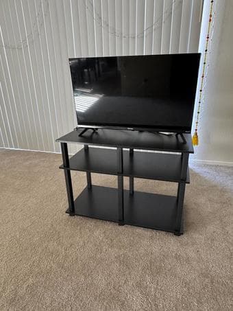 TV, TV stand, table, chairs and sofa 2