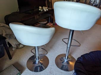 2 adjustable white faux-leather cushioned low-back bar stools; $40 obo 3