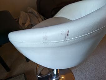 2 adjustable white faux-leather cushioned low-back bar stools; $40 obo 4