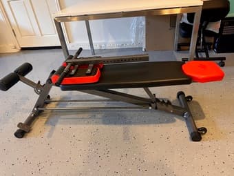 Adjustable exercise bench, like new (originally $150) 1