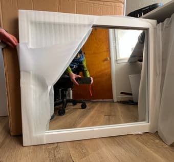 white framed wall mirror , New in box 1