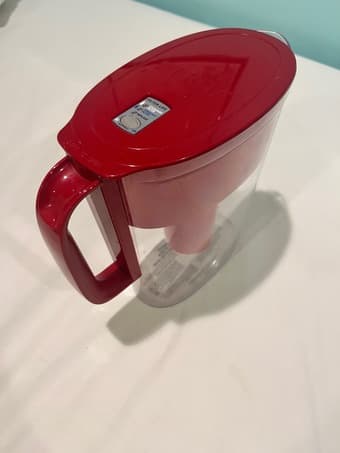 Brita, utensil rack, vase and assorted items 1