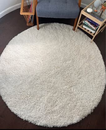 5'3" round cream shag rug + magazine rack 1