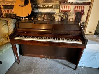 Upright wooden piano 1