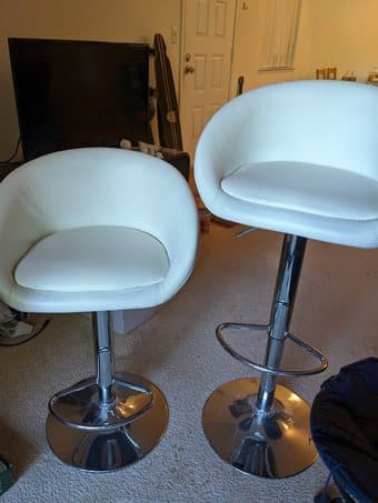 2 adjustable white faux-leather cushioned low-back bar stools 2