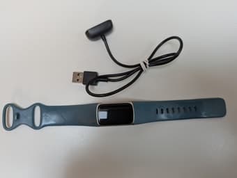 Fitbit charge 5 with box and charger and spare strap included 2