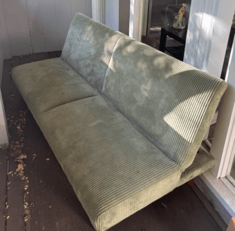 green corduroy foldable couch/futon for sale 1