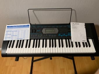 Casio CTK-2100 61-Key Electric Keyboard 1