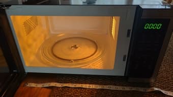 Oster 1.1 cu. Ft. Countertop Microwave Oven 1