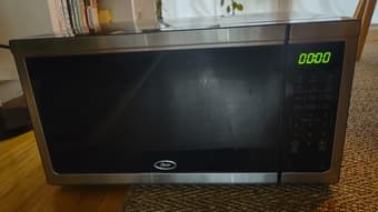 Oster 1.1 cu. Ft. Countertop Microwave Oven 2