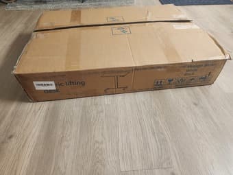 New, unassembled electric standing desk 3