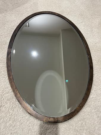 Oval distressed bronze mirror 1