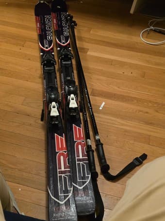 Pair of Salomon skis and poles 1