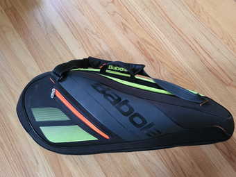 Tennis rackets, expandable bag, and balls 2