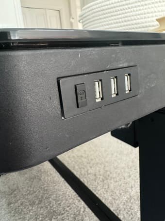 Black standing desk with USB ports 2