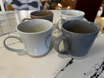 16 piece tableware set (plates, cups, bowls)- like new 2