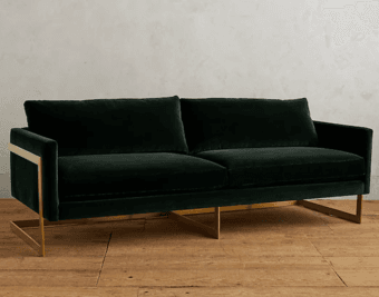 dark green velvet couch with gold hardware 3