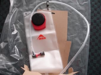 Brand new hiking backpack ($40) and hydration system ($20) 2