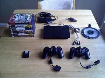 Playstation 2 with 10 games -- $200 obo 1