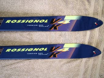 Salomon 178 CM downhill skis and 2009 Carrera AirMatic ski helmet 2