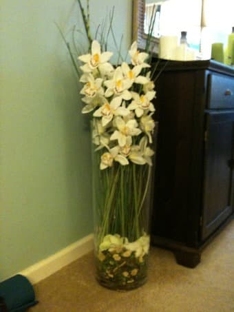 Beautiful fake flower arrangement in tall glass vase - $60 1